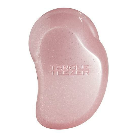 タングルティーザー　TANGLE　TEEZER　オルジナル　シャンパンロゼは、柄のないブラシ自体を握りこむ形状、頭皮に沿うようにラウンドした長短のブラシの配合などは、すべて人間工学に基づき計算して生まれた、髪を健やかに保つために考え抜かれたデザインです。